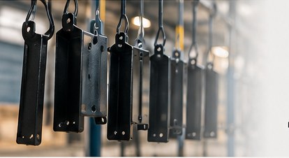 Metal components in an industrial finishing area